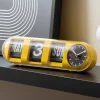 Karlsson Wandklok Tube Flip helder geel