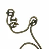 Light en Living Wandornament FACE antiek brons - 2 afmetingen Sale